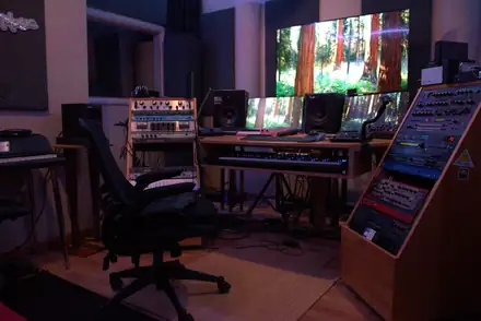 Studio B production suite with outboard racks and keyboards
