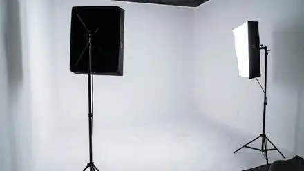 Studio C white cyclorama stage with softbox lighting